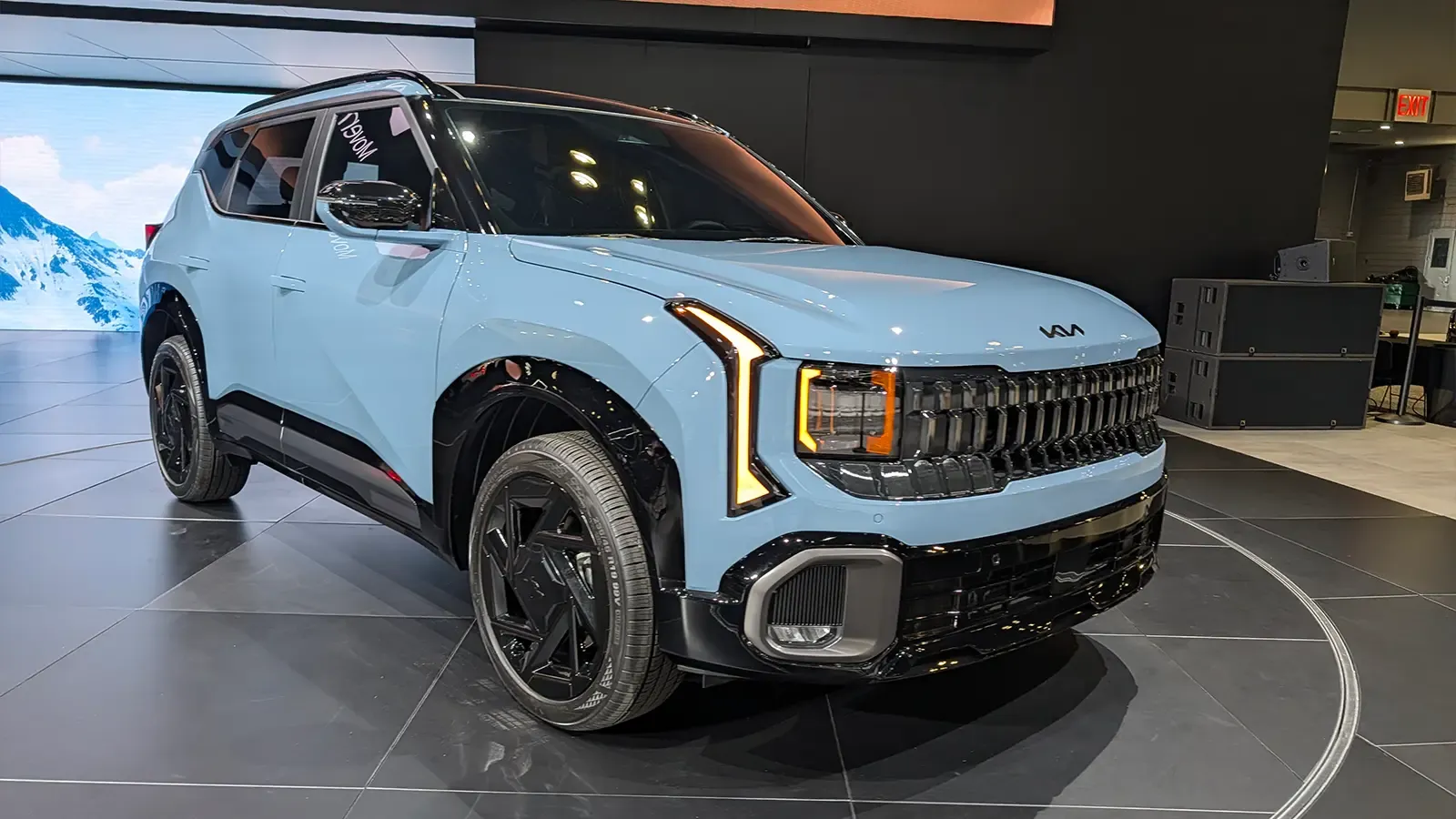 A light blue 2027 Kia Seltos three quarter front view at thh 2026 NY Auto Show