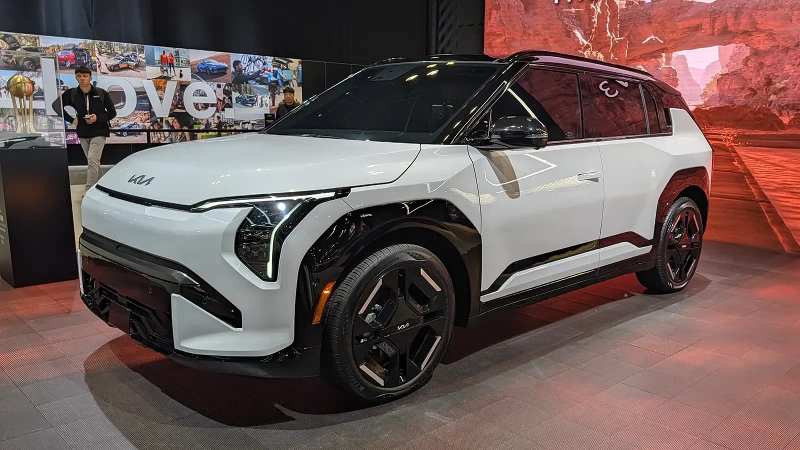 A white 2027 Kia EV3 three quarter front view at the 2026 New York auto show