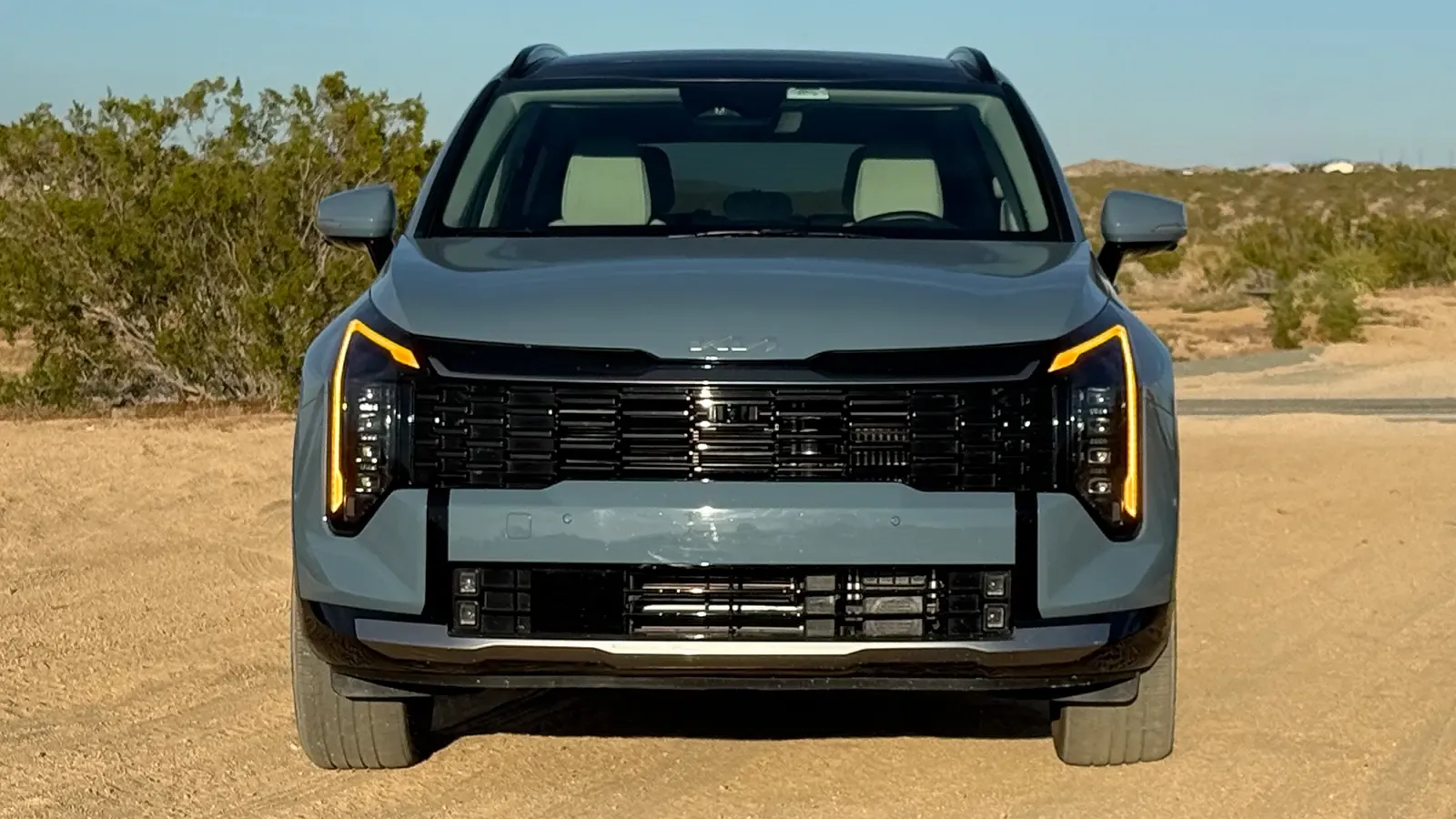 A dark gray 2026 Kia Sportage front nose view