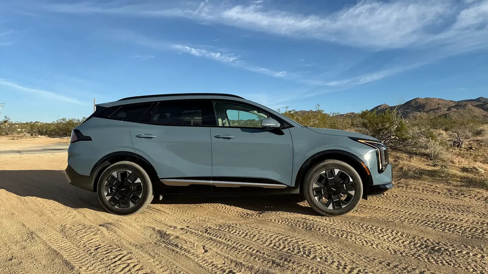 A dark gray 2026 Kia Sportage side view