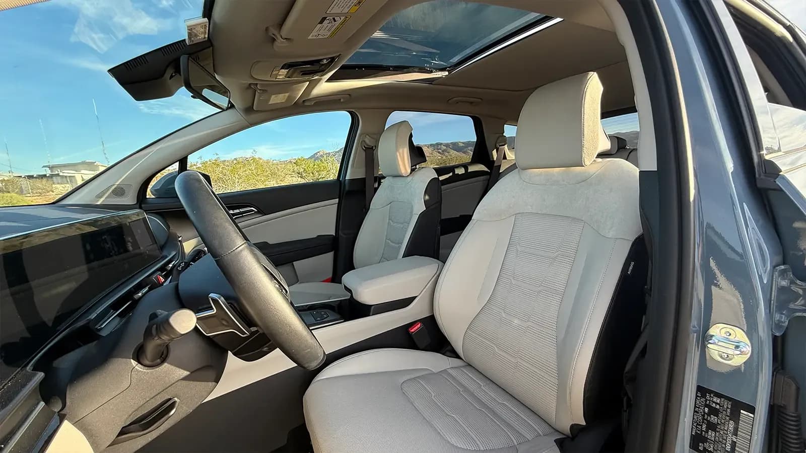 A 2026 Kia Sportage interior driver side view