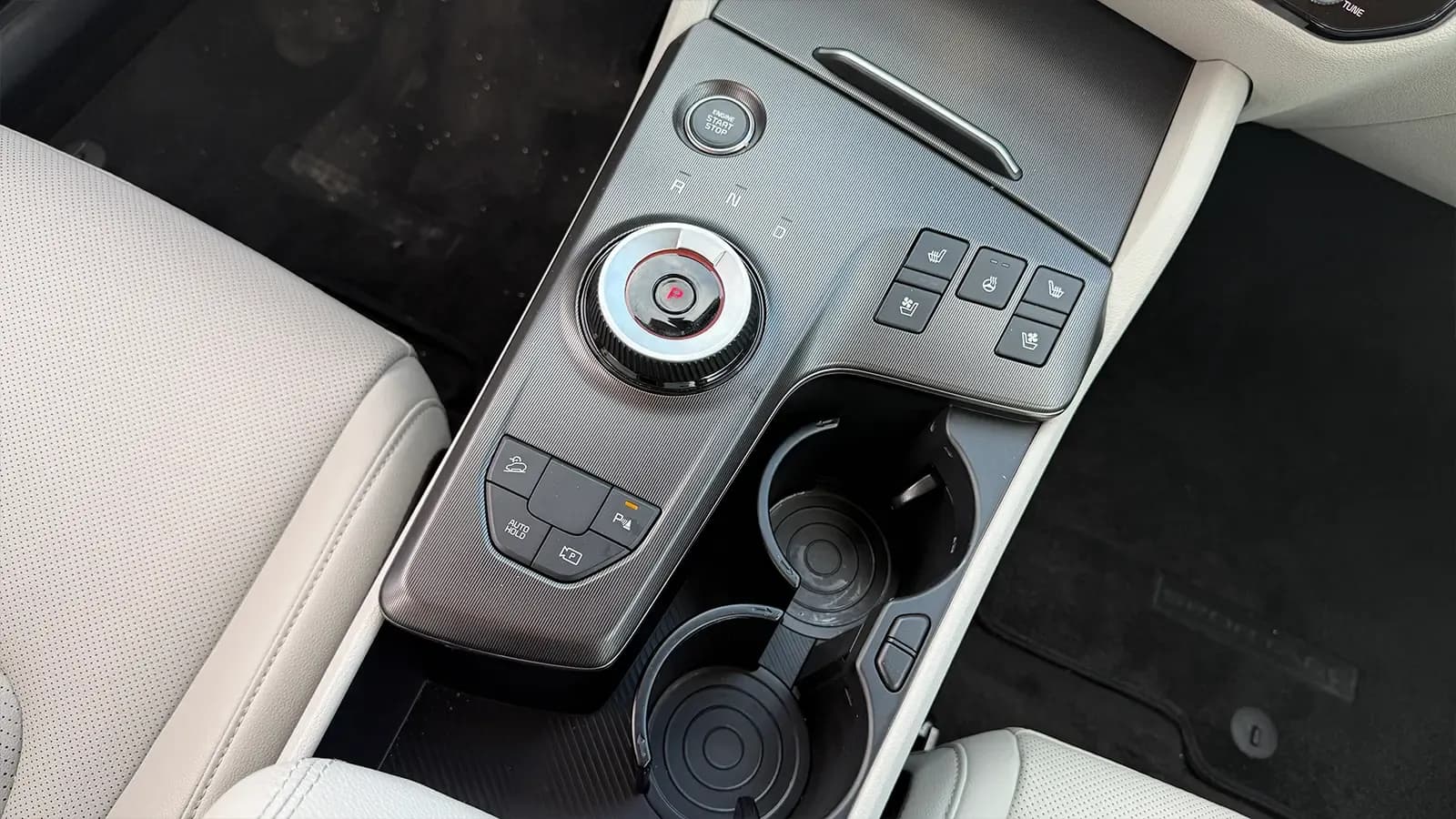 A 2026 Kia Sportage interior center console top down view