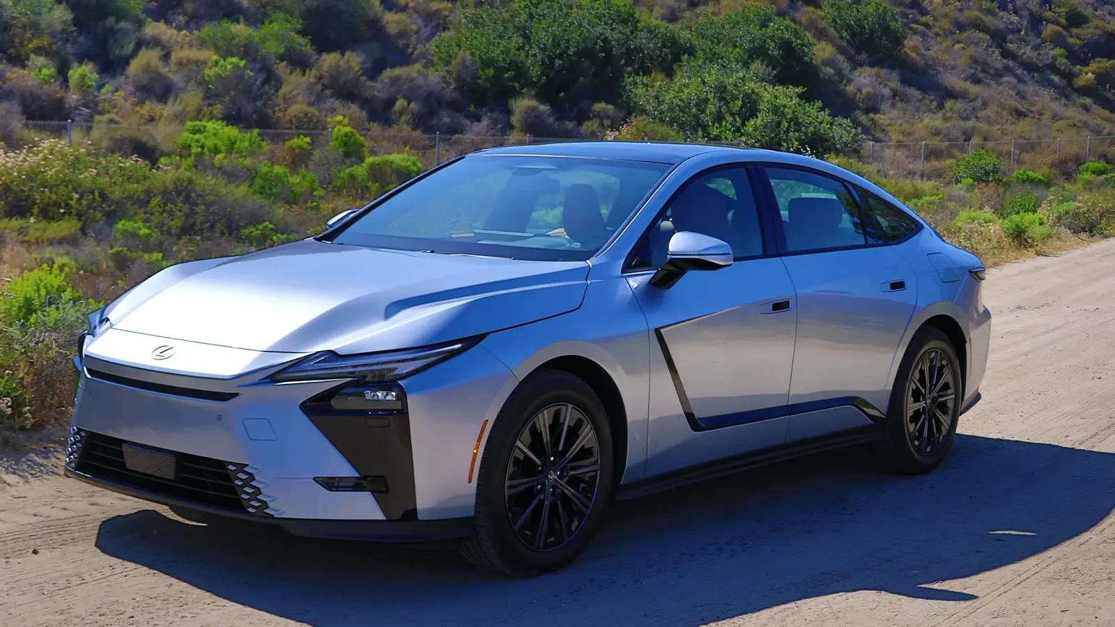 2026 Lexus ES350h Ultra White Front and Rear Exterior view standing on a highway
