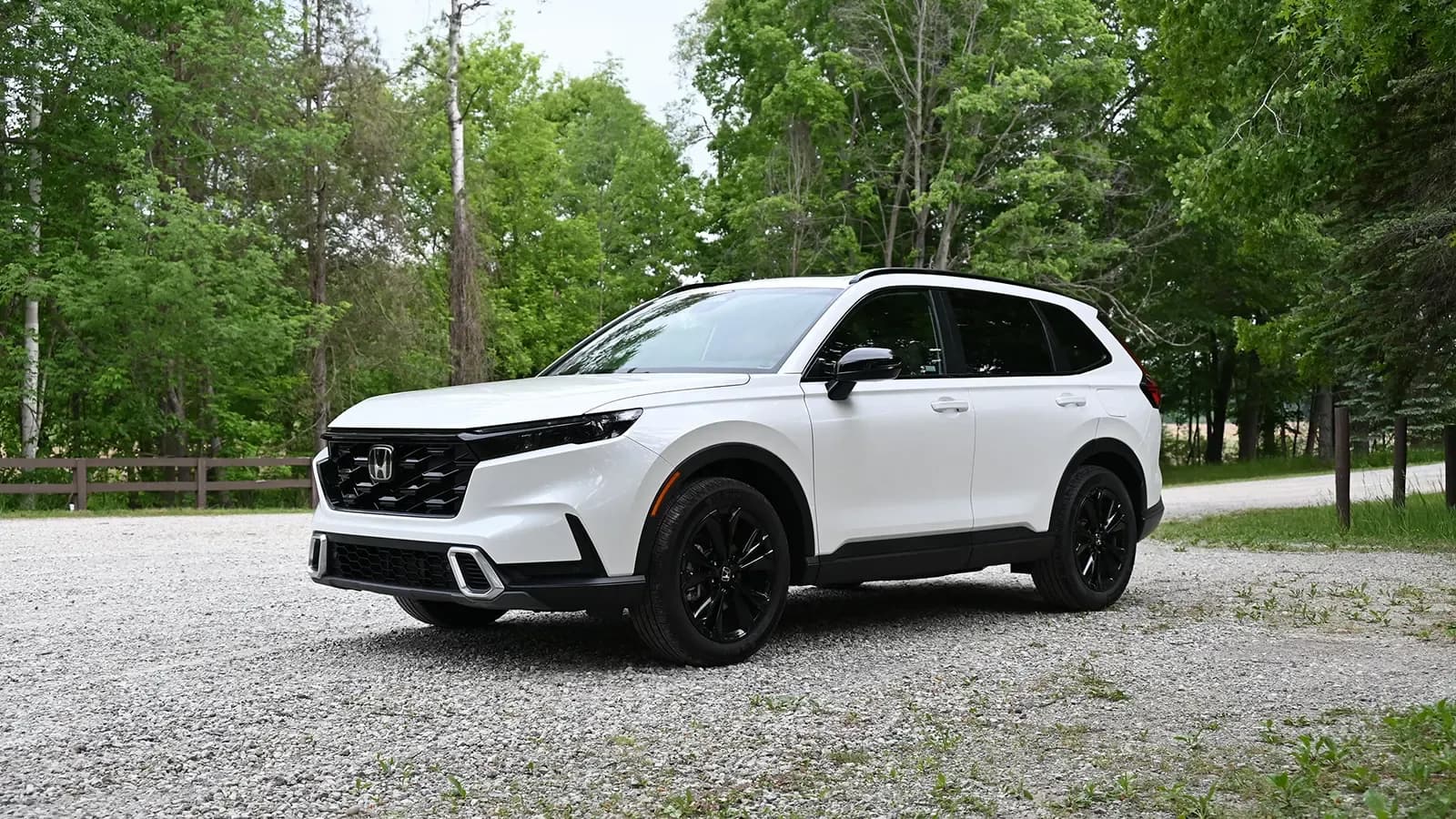 White 2026 Honda CR-V Hybrid Sport parked outdoors