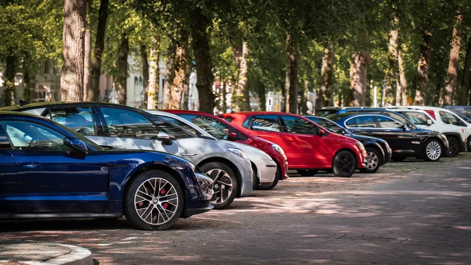 Cars standing at dealership parking lot