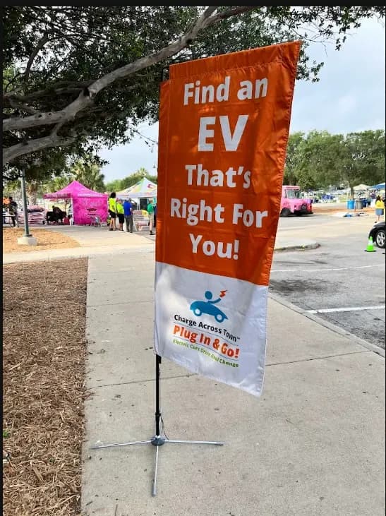 Orange EV event banner reading 'Find an EV That's Right For You!'