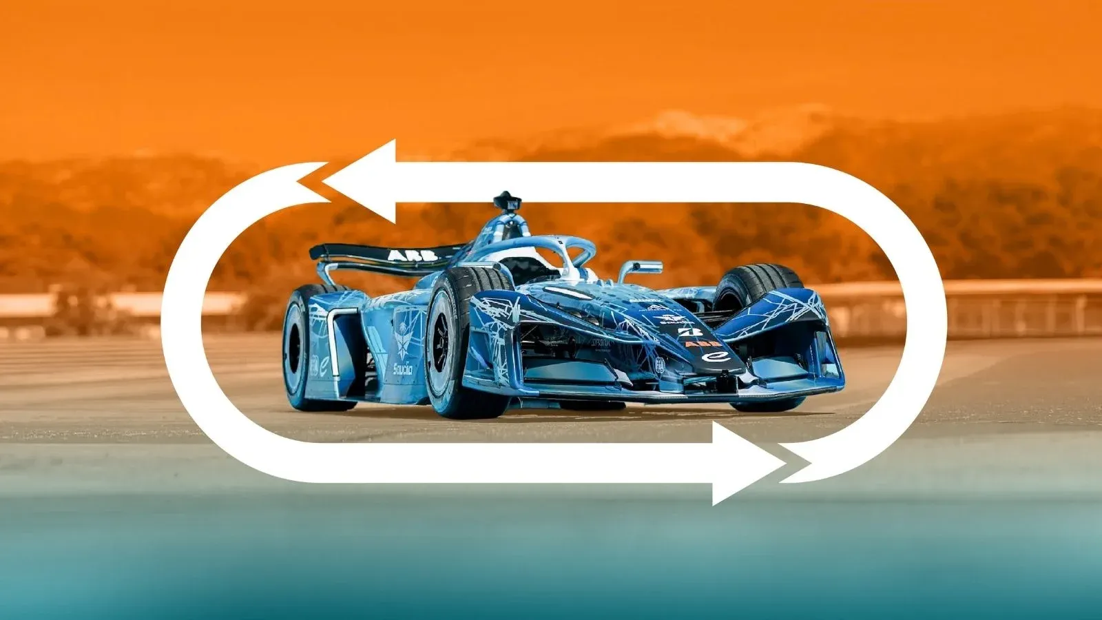 A blue Formula E race car encircled by white looping arrows, set against an orange-tinted track and hillside.