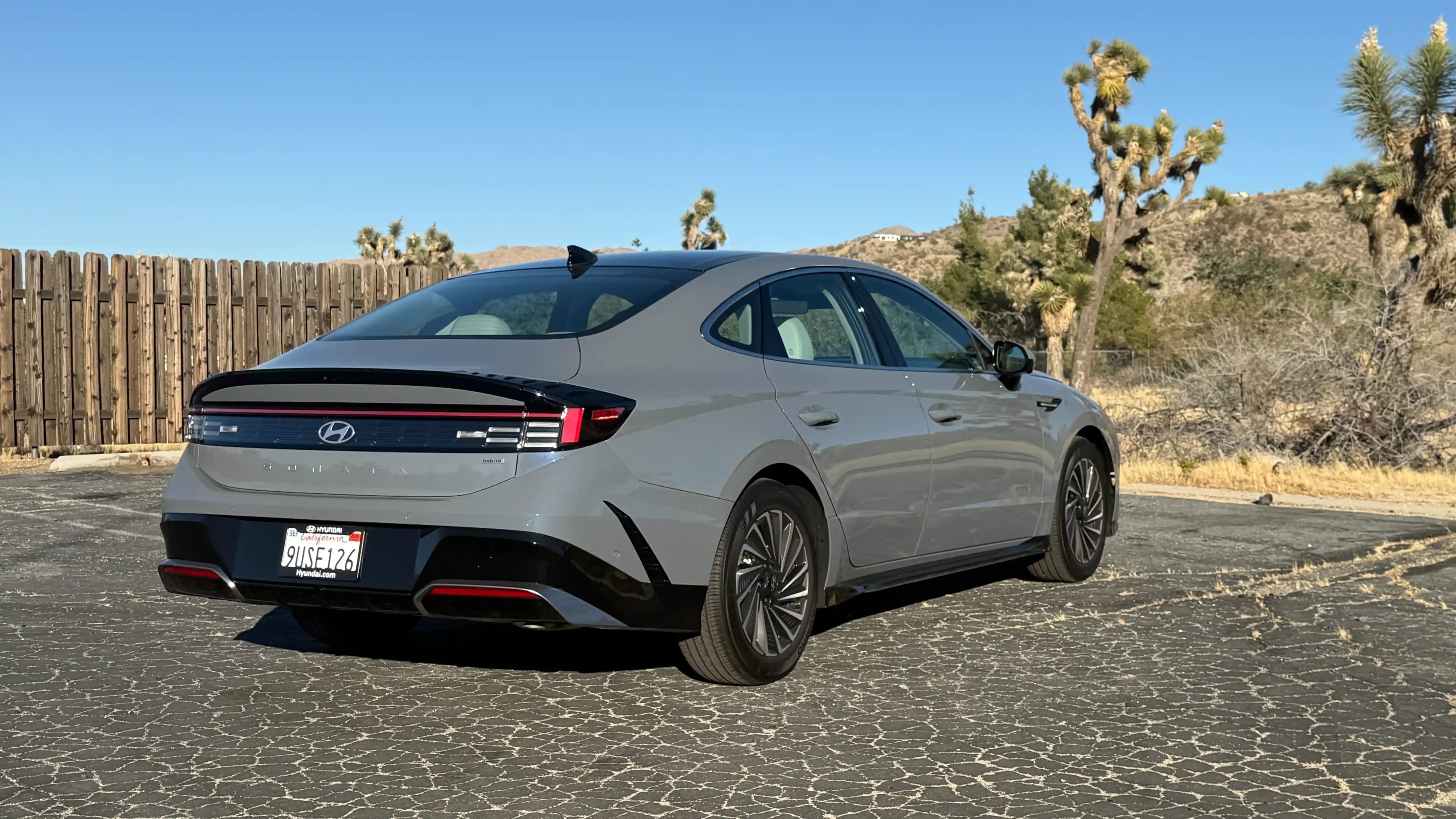 Rear angled profile of a grey Hyundai Sonata Hybrid