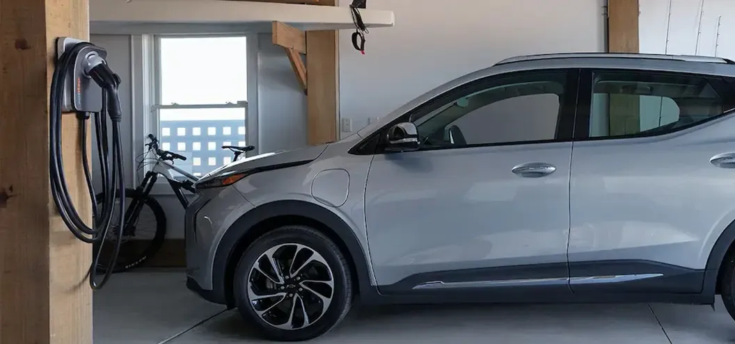 2022 Silver Chevy Bolt EUV Charging in Garage
