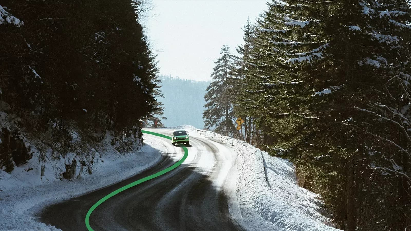 ev driving on winter road