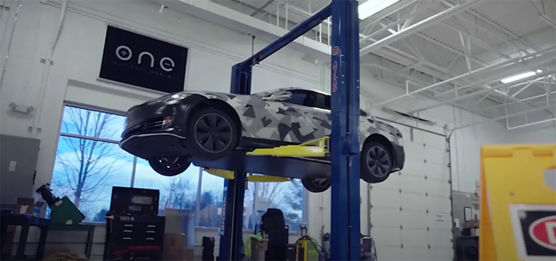 ev car up on carlift
