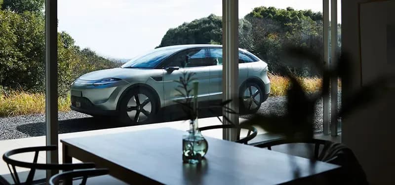 View of Sony EV SUV Through A Kitchen Window