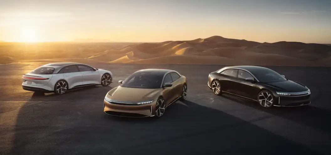 Lucid ev in front of sunset