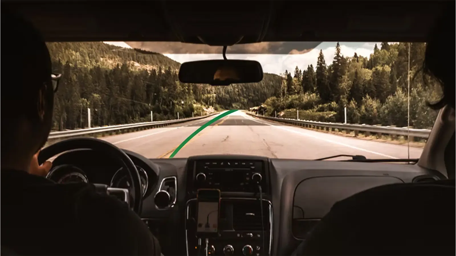 driving through mountains following GreenCars path