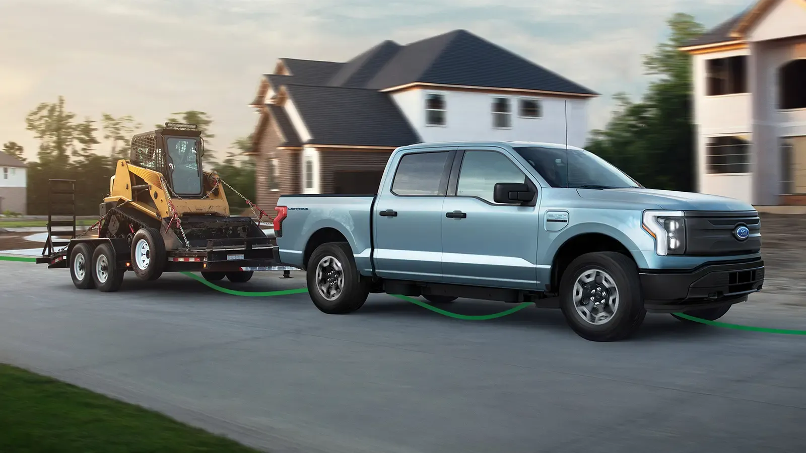 Ford electric truck towing a construction trailer