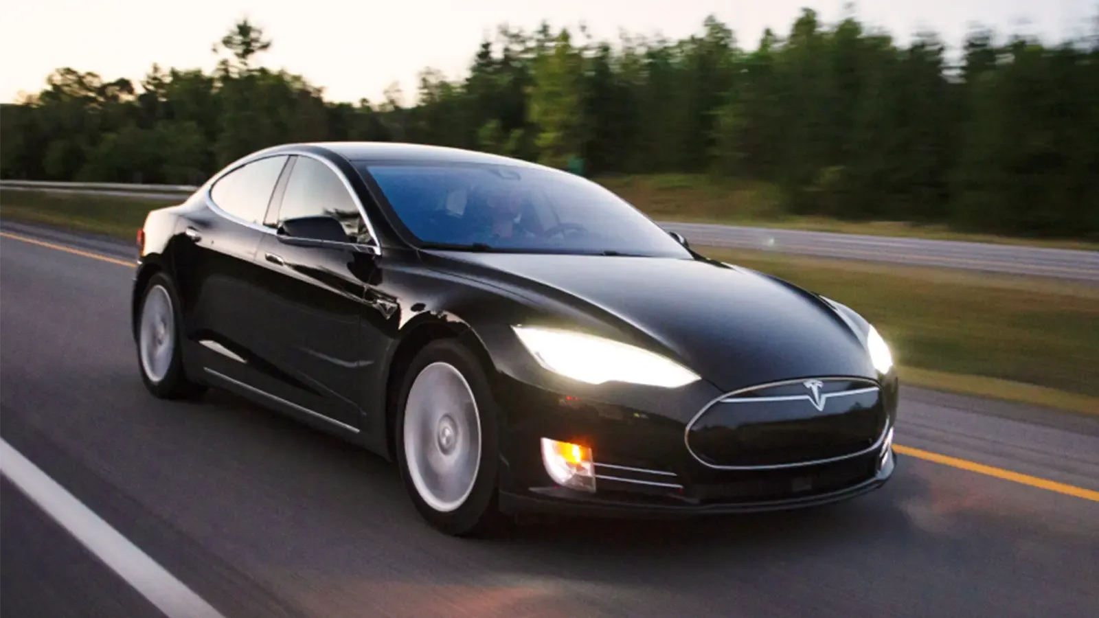 a Tesla driving fast