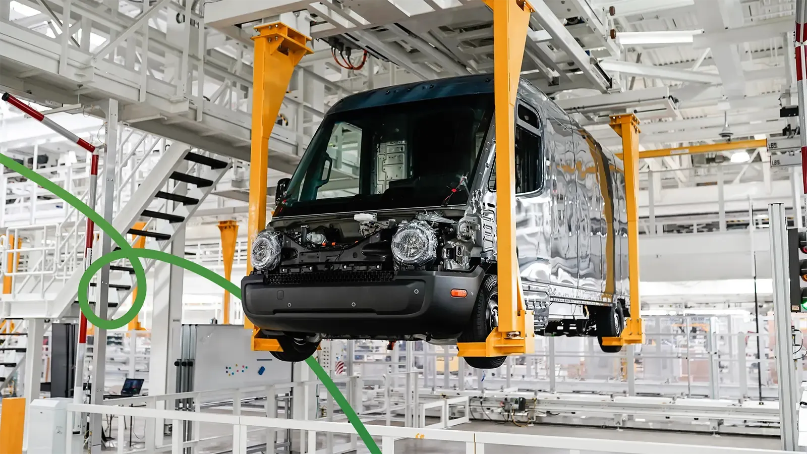 electric truck moving through a factory