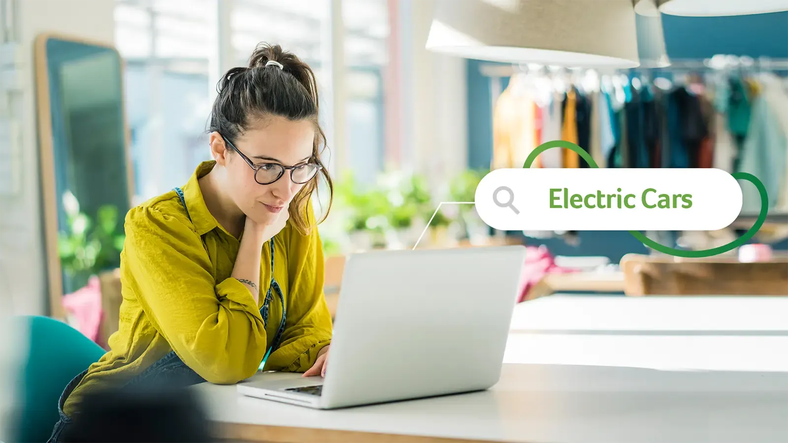 A woman researching electric cars