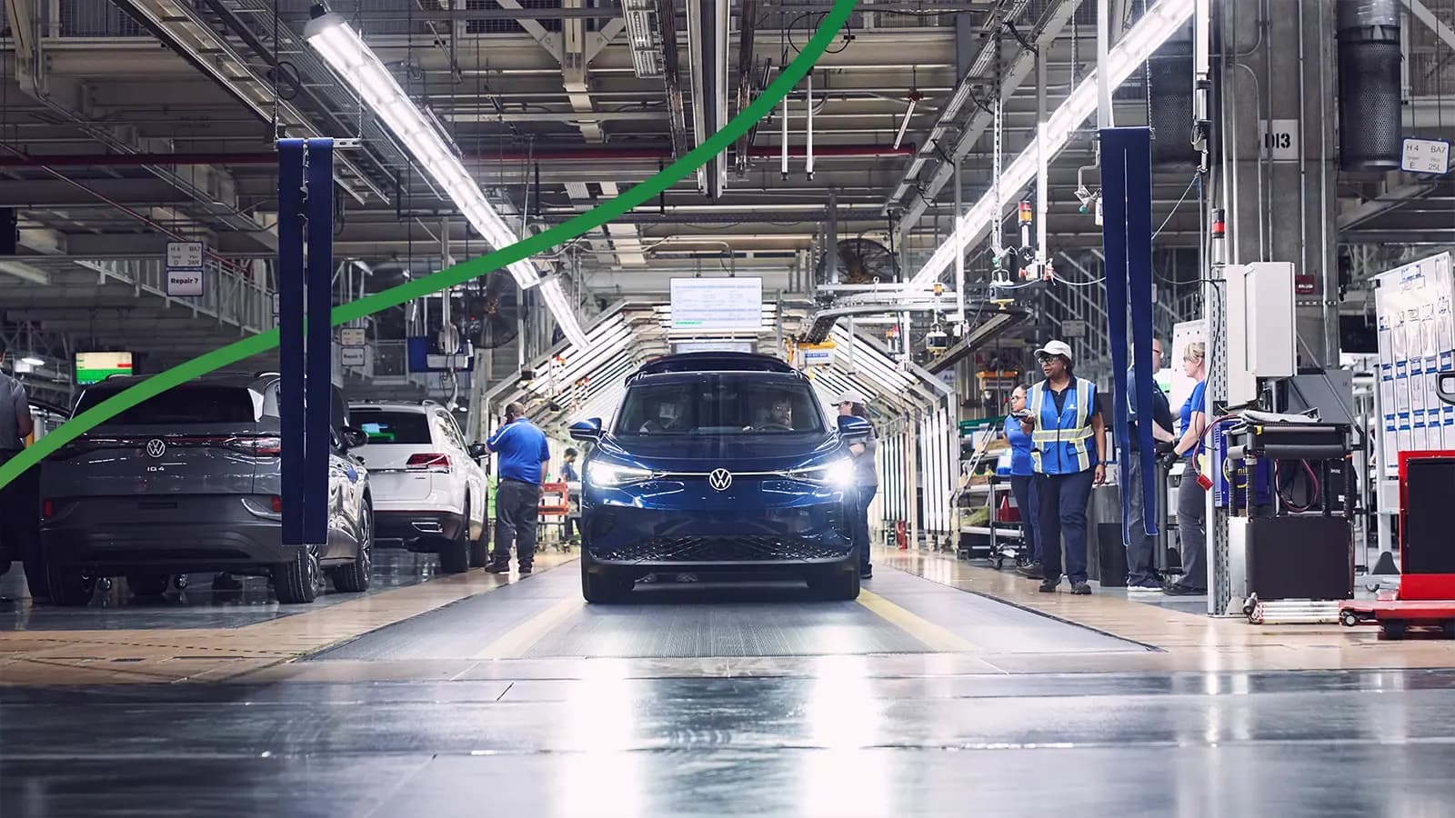 electric vehicle being built in manufacturing facility