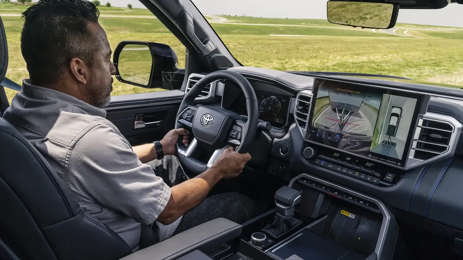 Man driving Toyota Truck