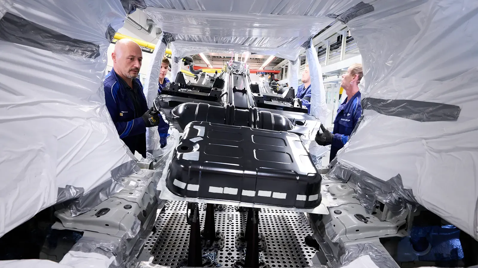 inside a bmw hydrogen X5 being built on the assembly line