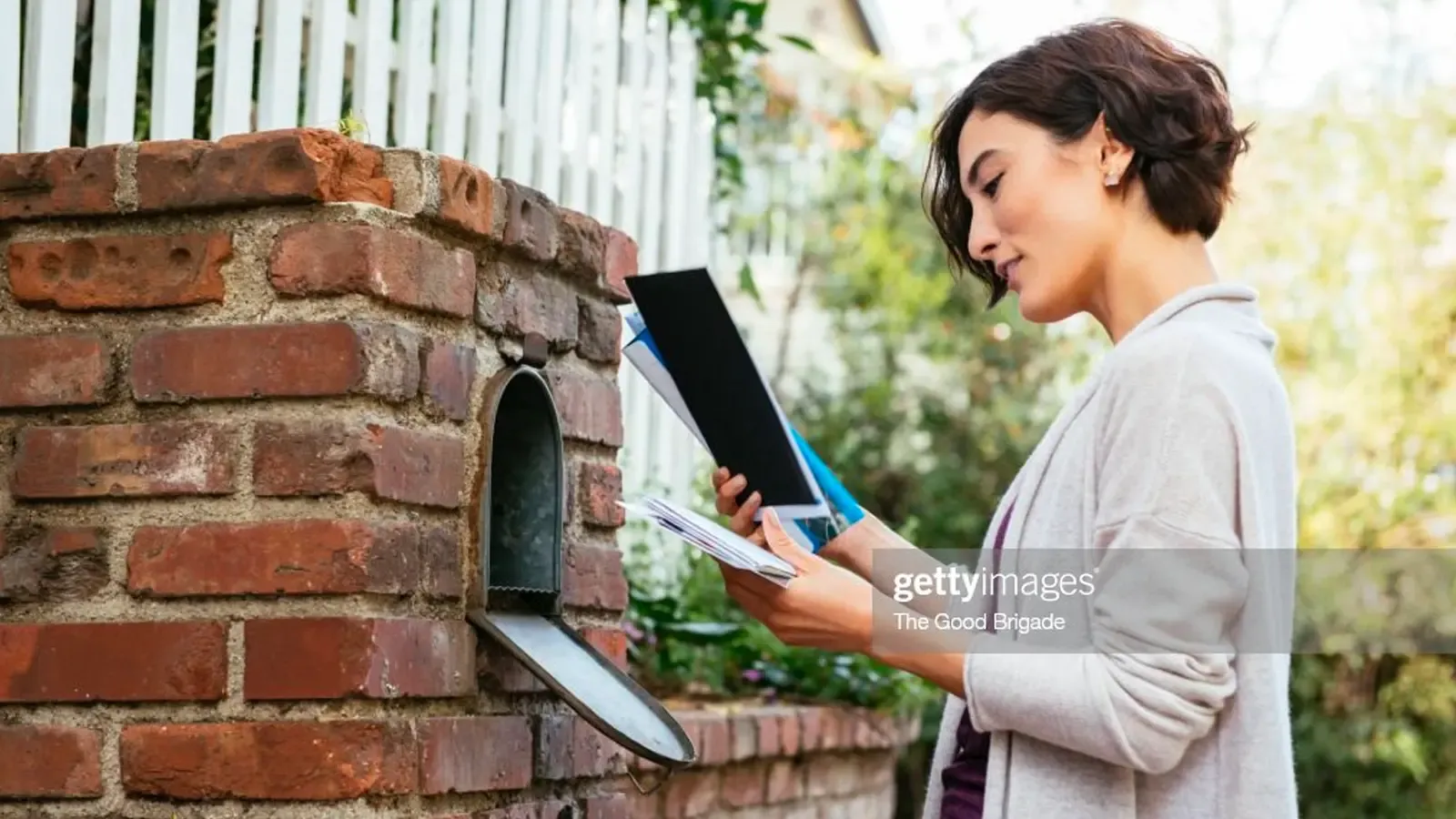 Woman checking her mail