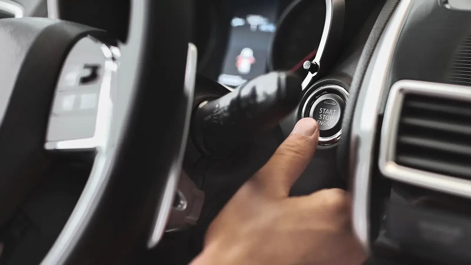Person Turning On Their Car