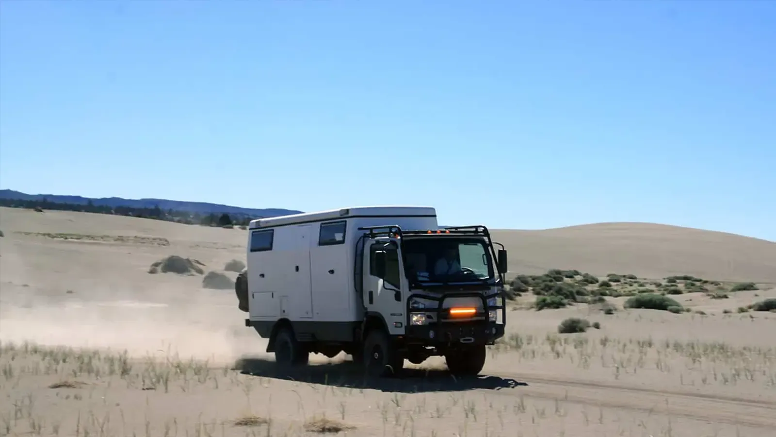 EarthCruiser driving in the plains.