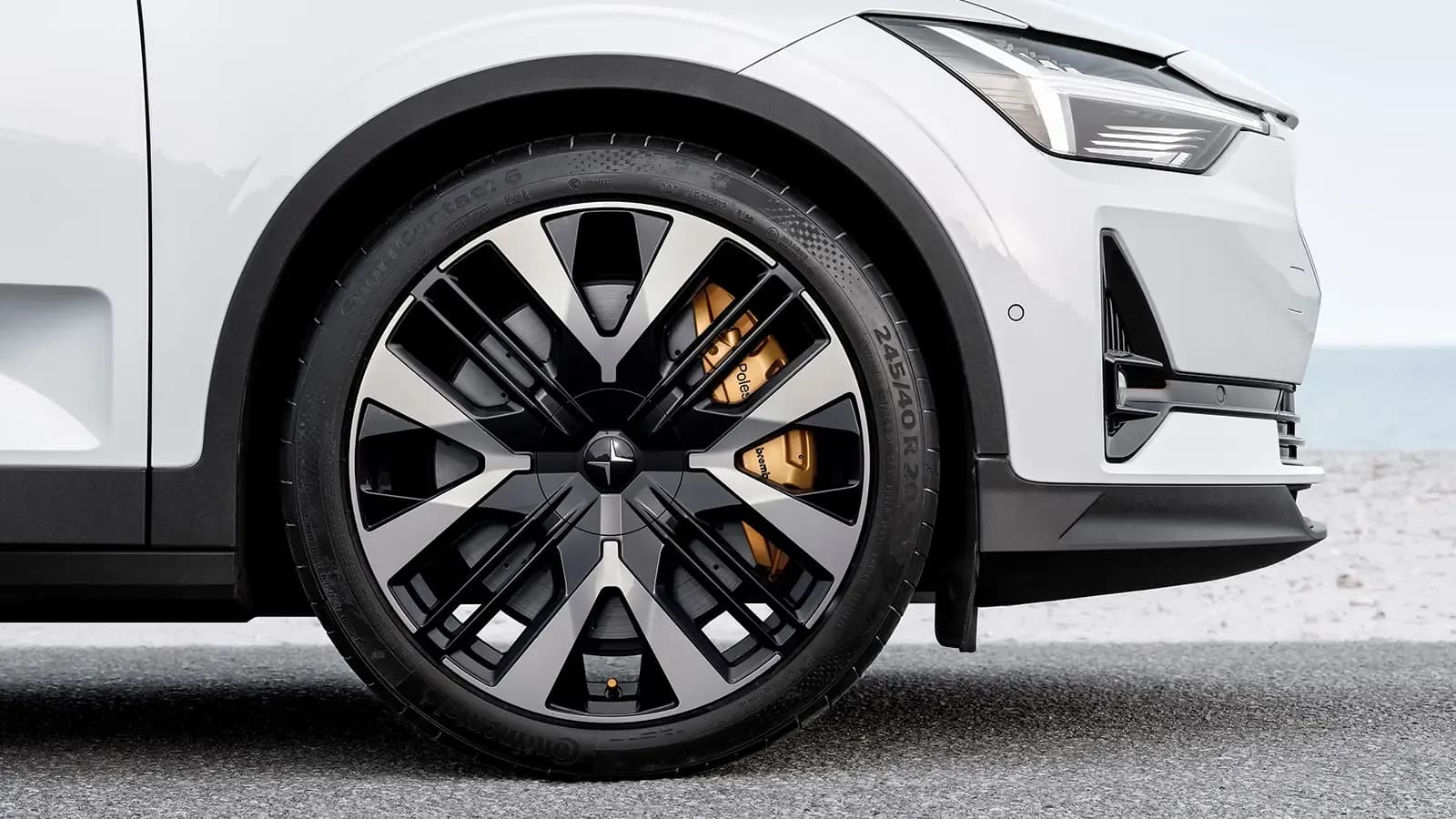White Polestar 2 close up of wheel exterior view.