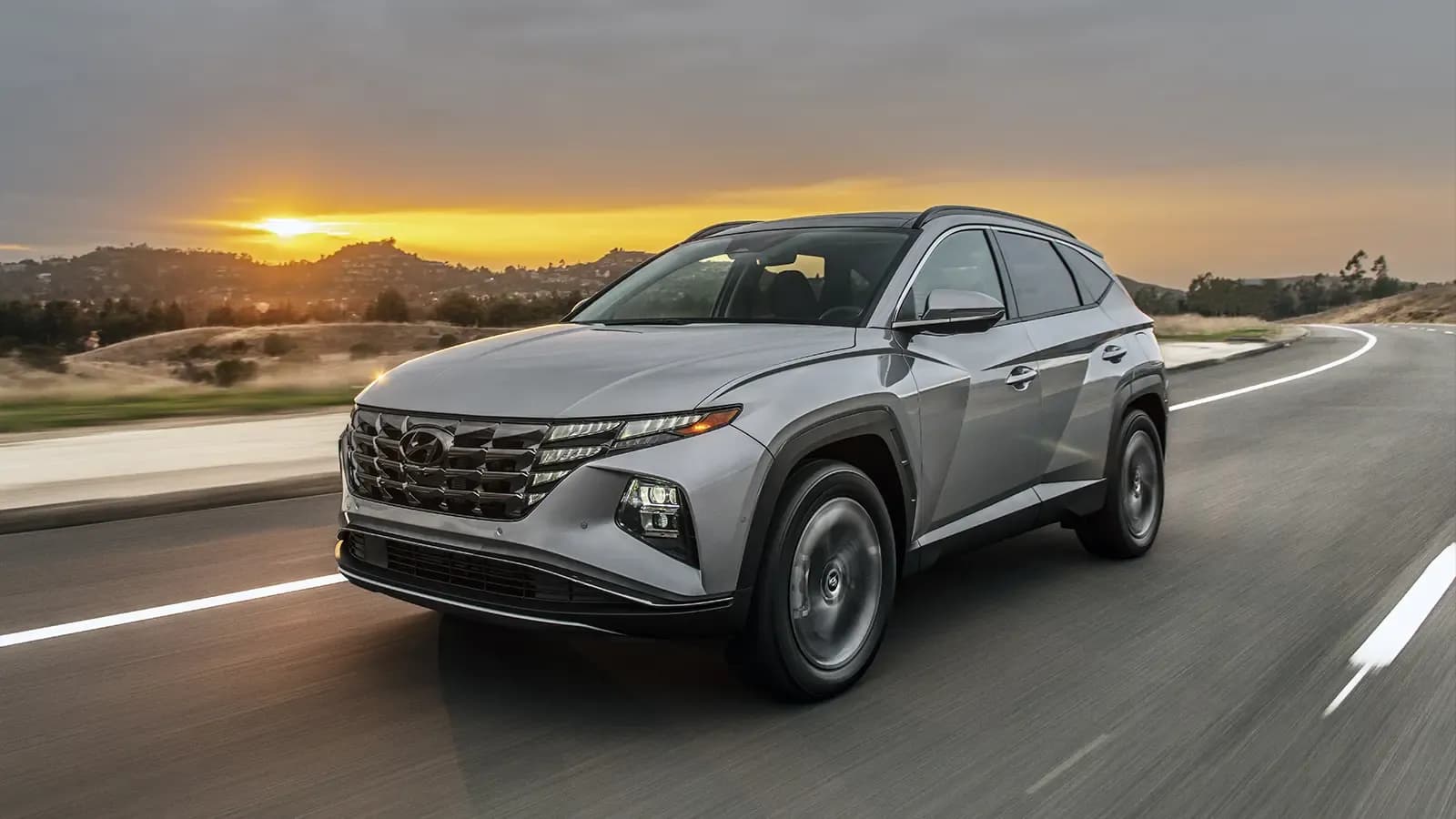 Hyundai Tucson PHEV in Front of Sunset