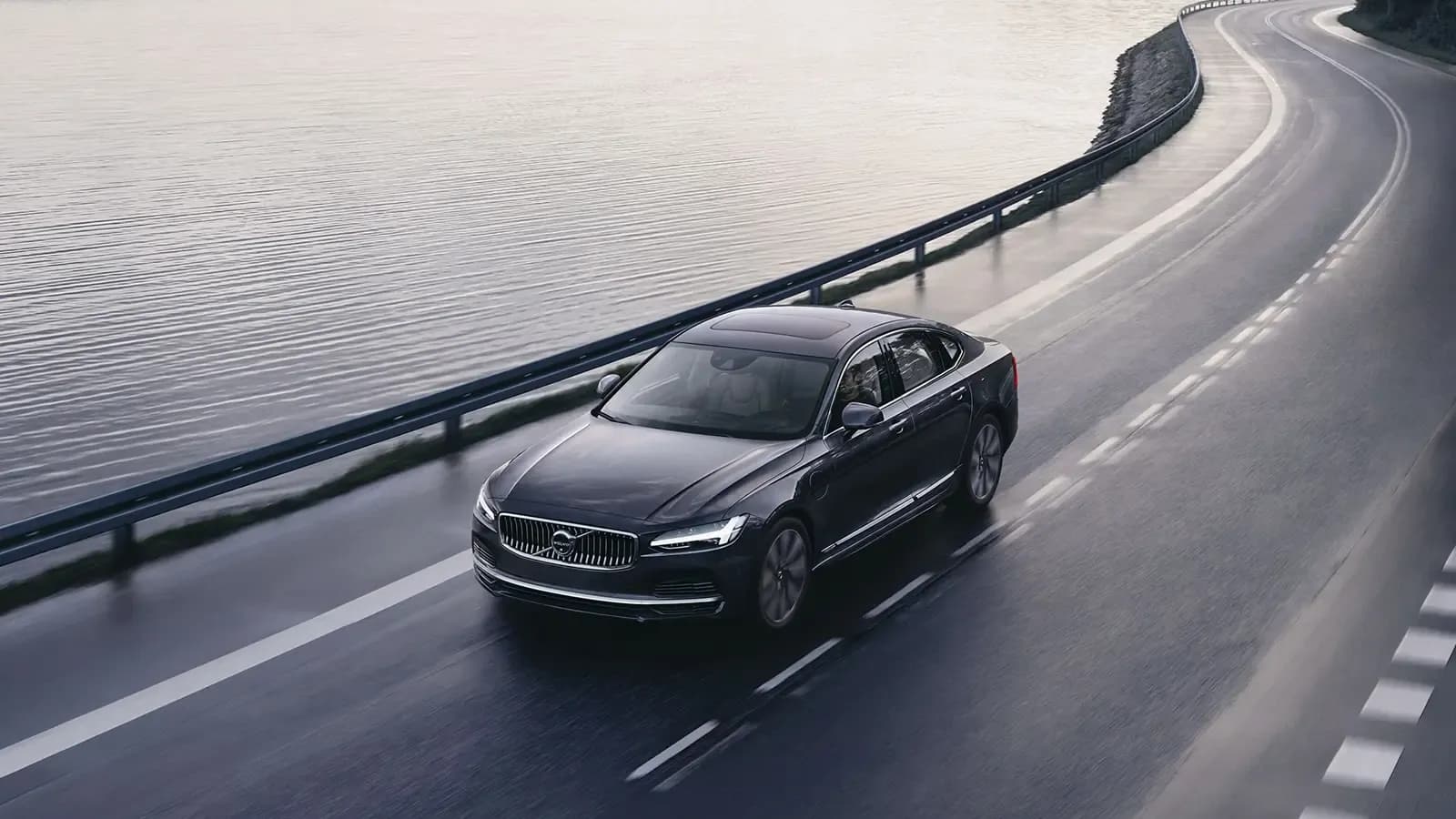 Volvo S90 T8 Driving Along the Water