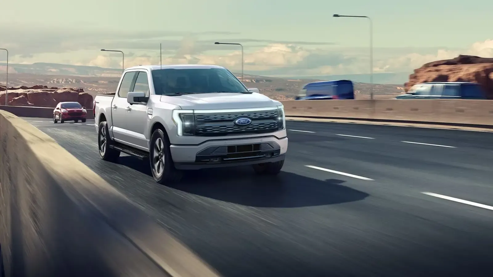 Ford F-150 Lightning driving on a highway