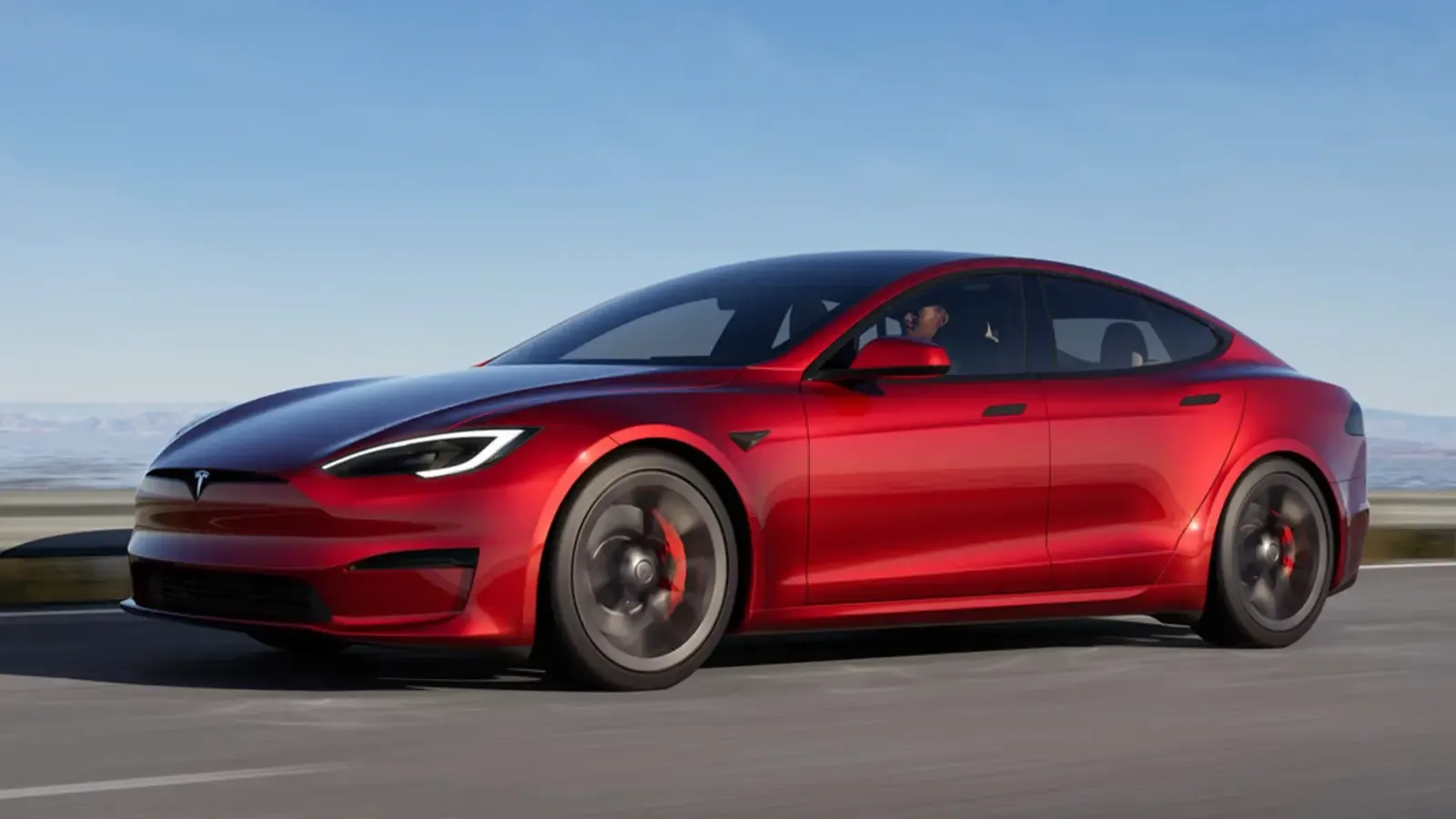Red Tesla Model S on the road
