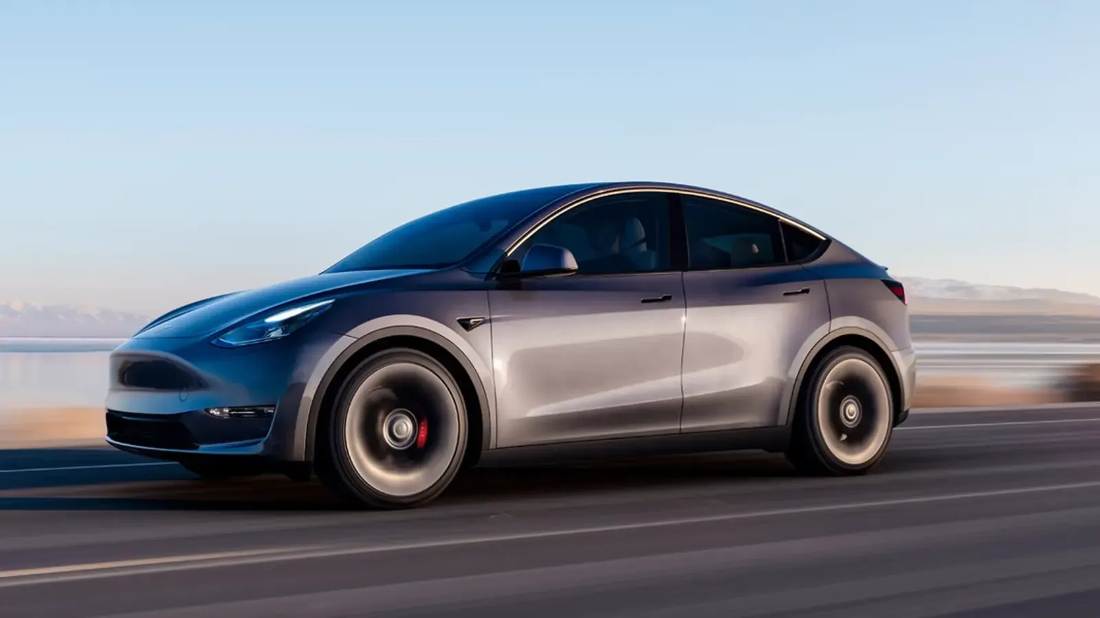 Grey Tesla Model Y on the road