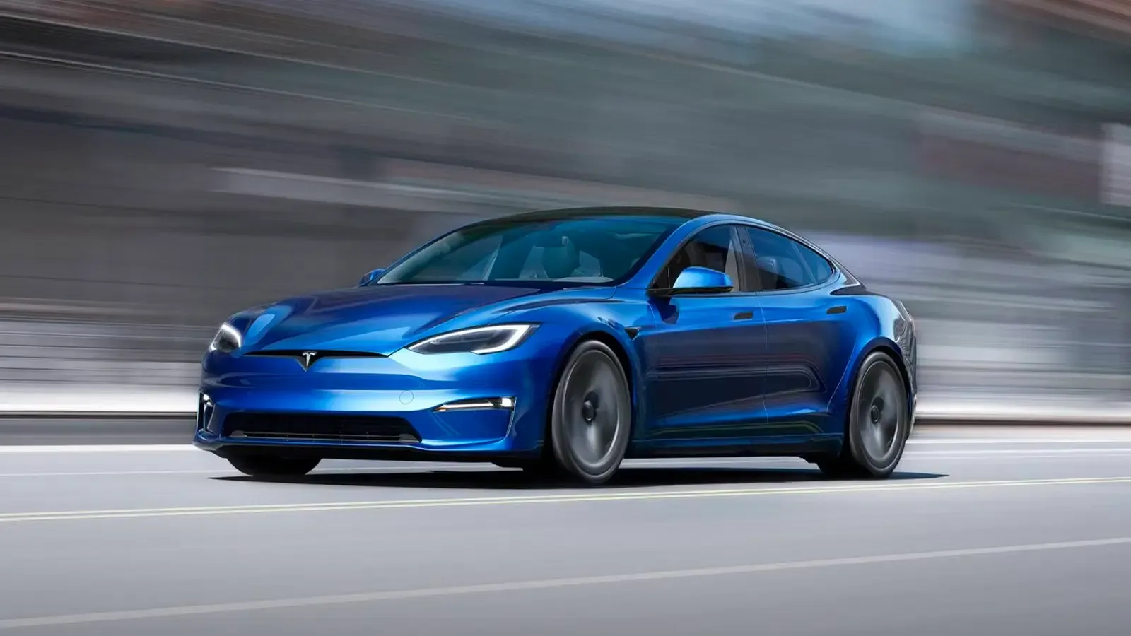 Tesla Model S Plaid driving on the road