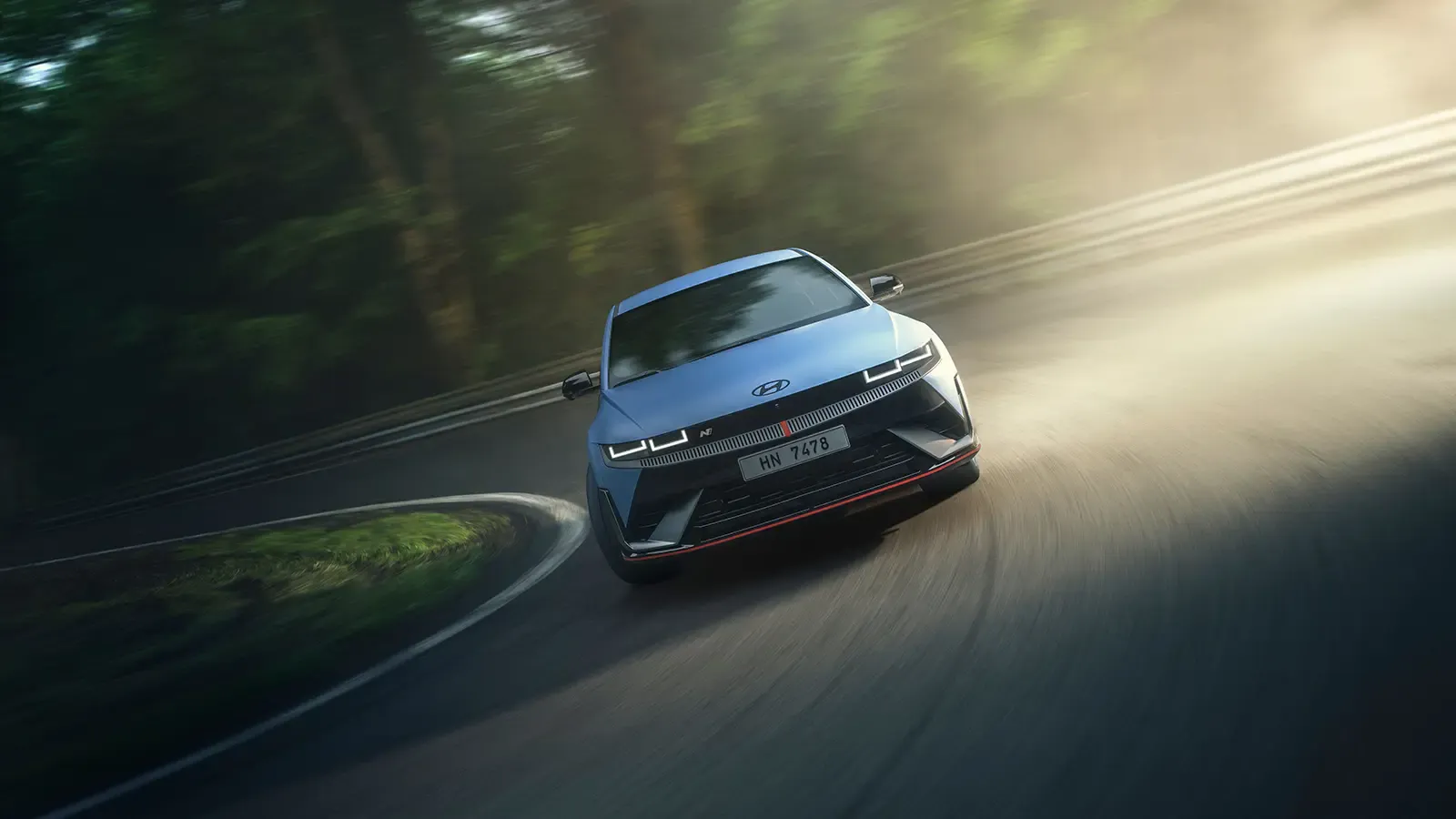 Hyundai Ioniq 5 N front exterior driving on a track