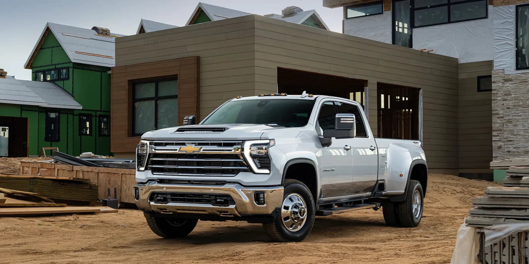 Chevrolet Silverado EV parked by a house