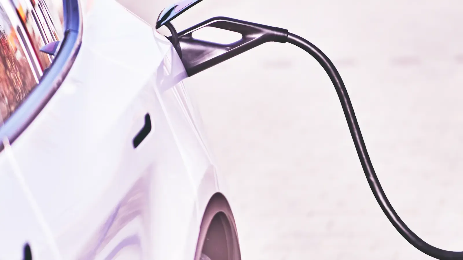 Close up of a car being charged