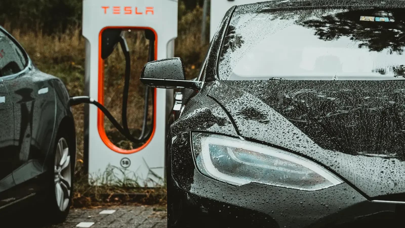 cars charging at Tesla charging station