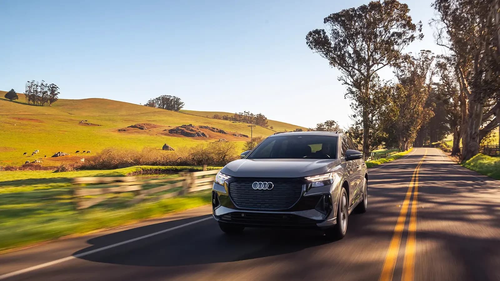 Audi q4-50 EV driving on the road
