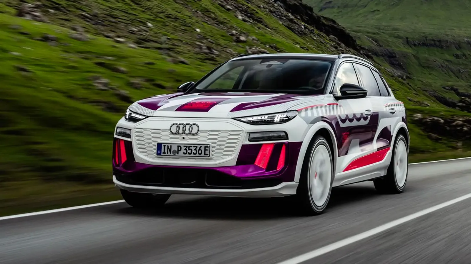 Audi Q6 E-Tron model driving on the road