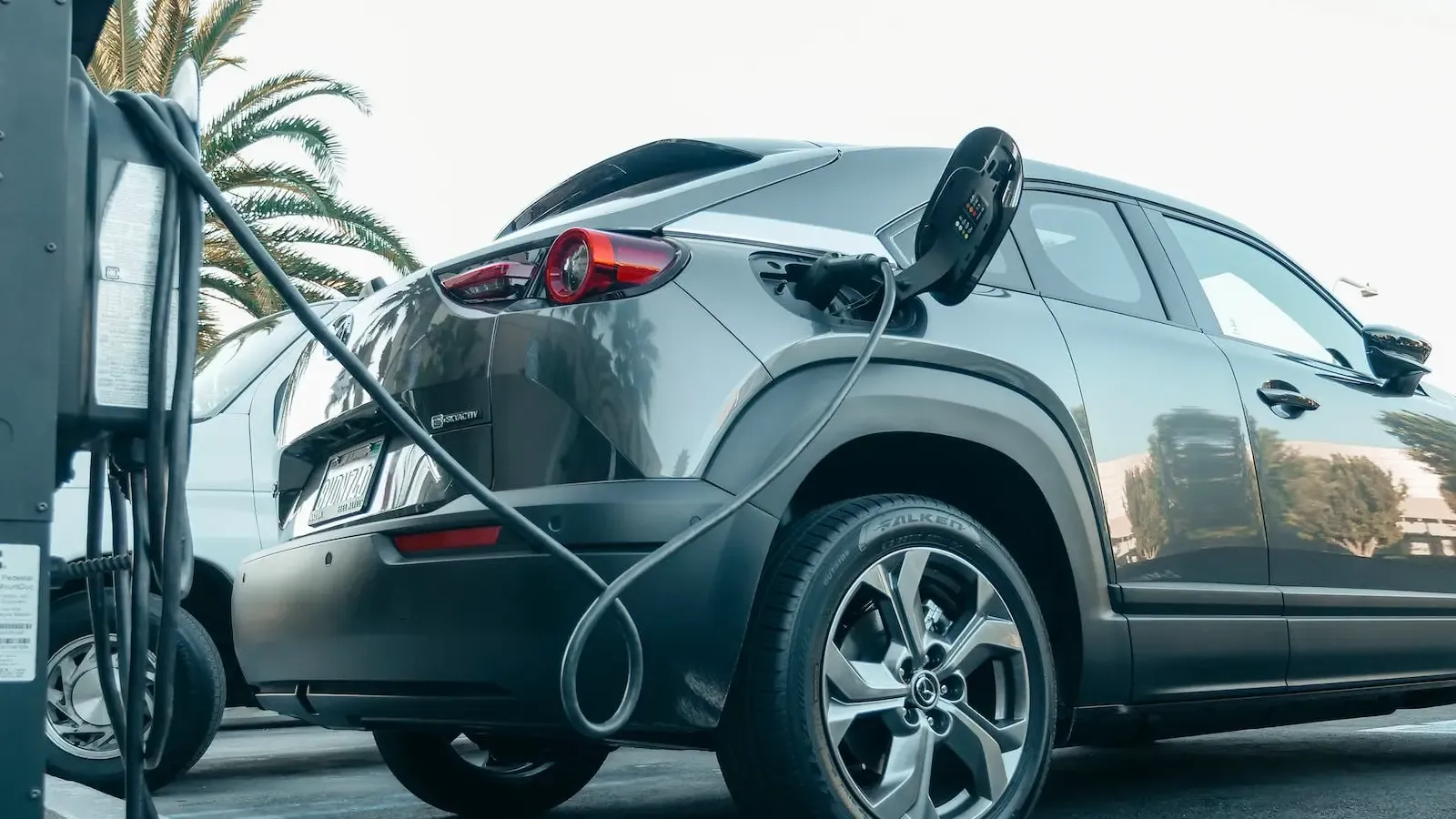 Car being charged at a charging station
