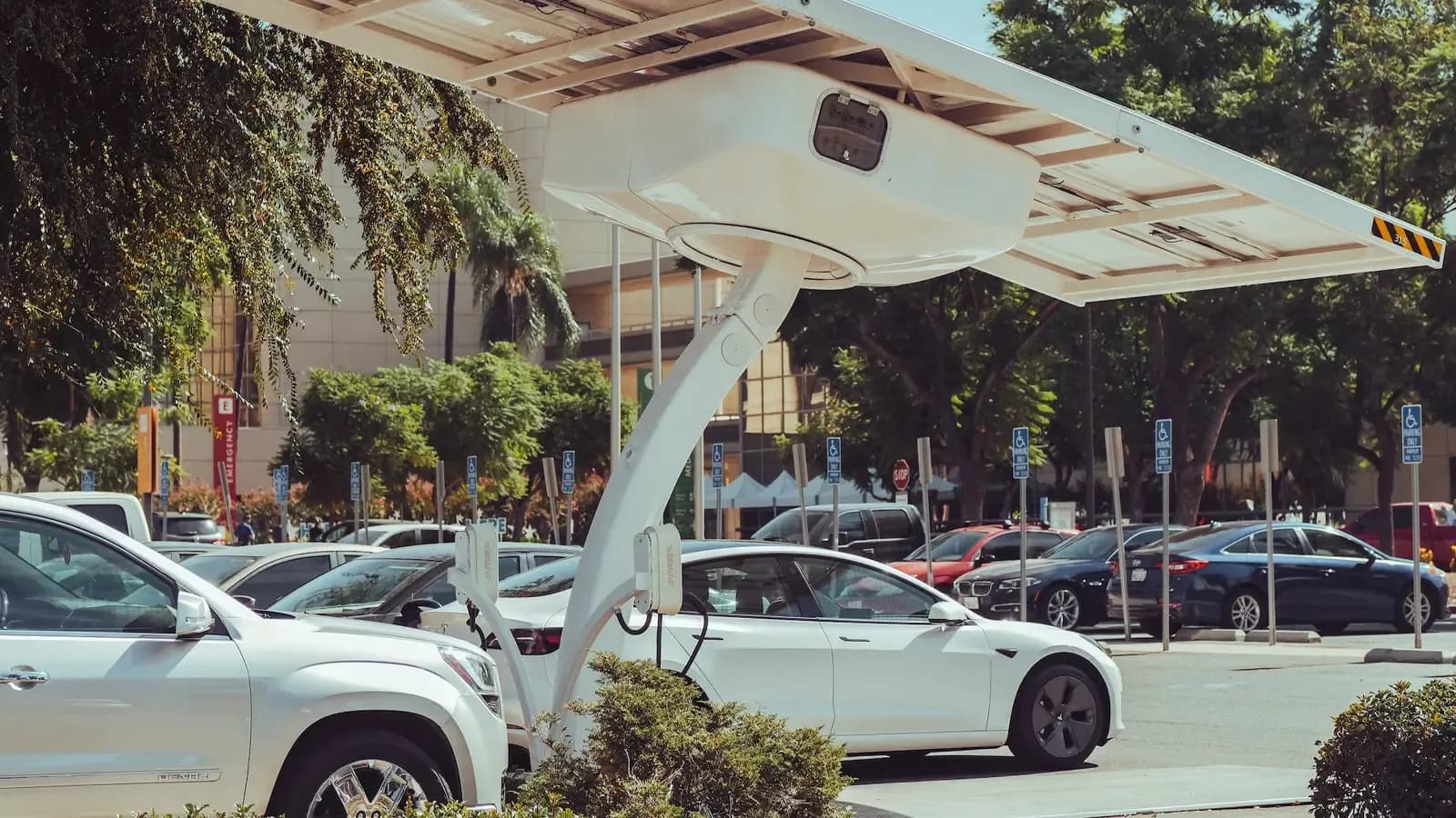 electric cars being charged in a station
