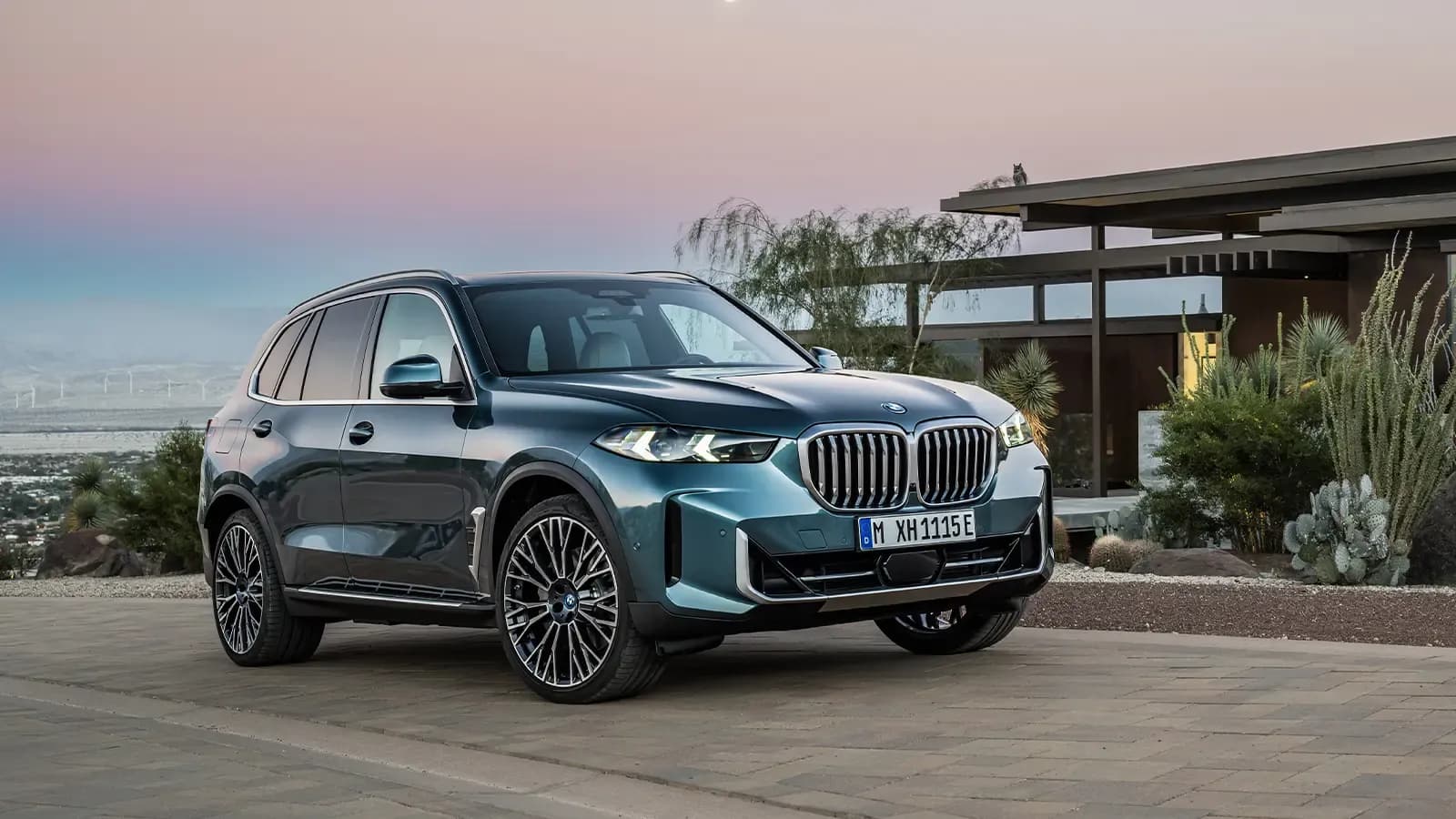 BMW plug-in hybrid parked in driveway