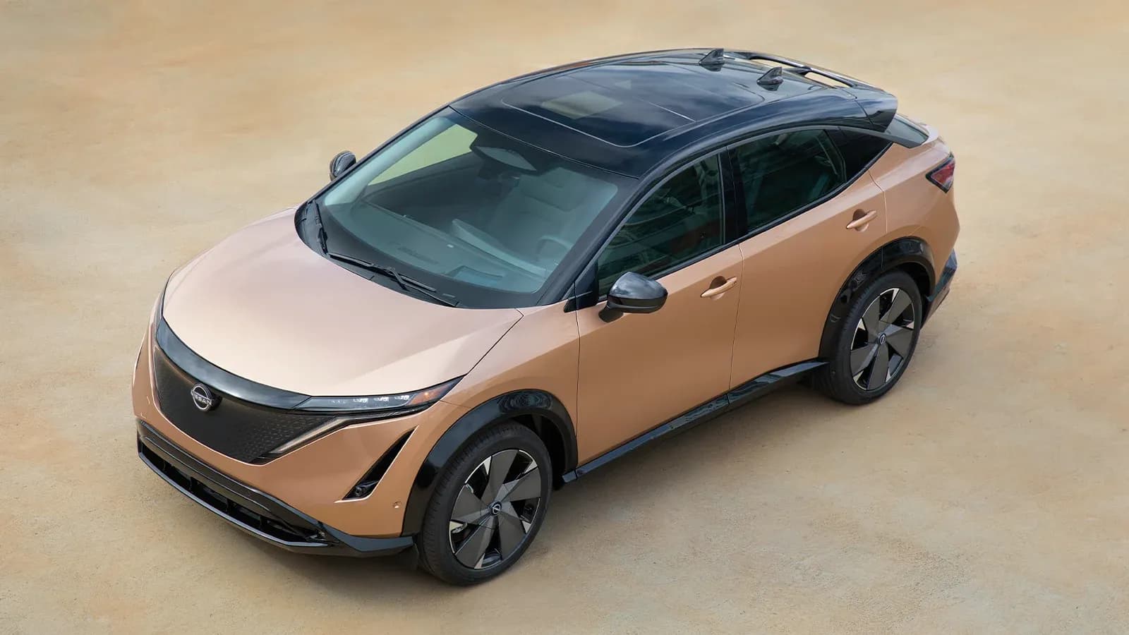 bird's eye view of a light orange nissan ariya