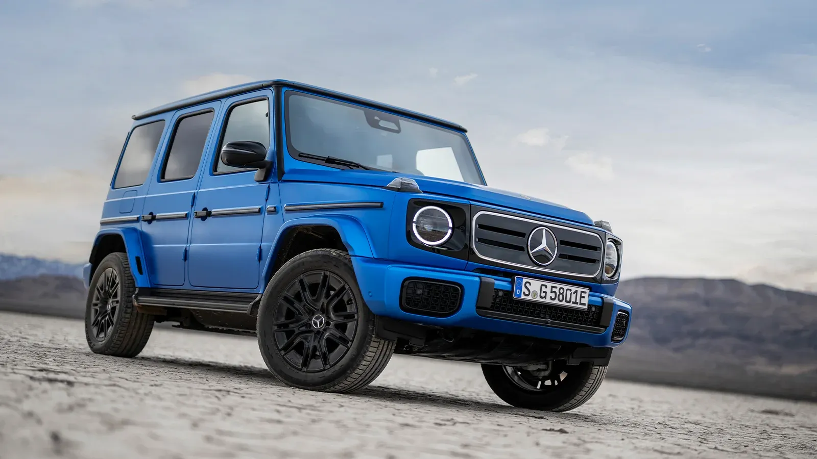 blue Mercedes-Benz electric G-Wagen driving