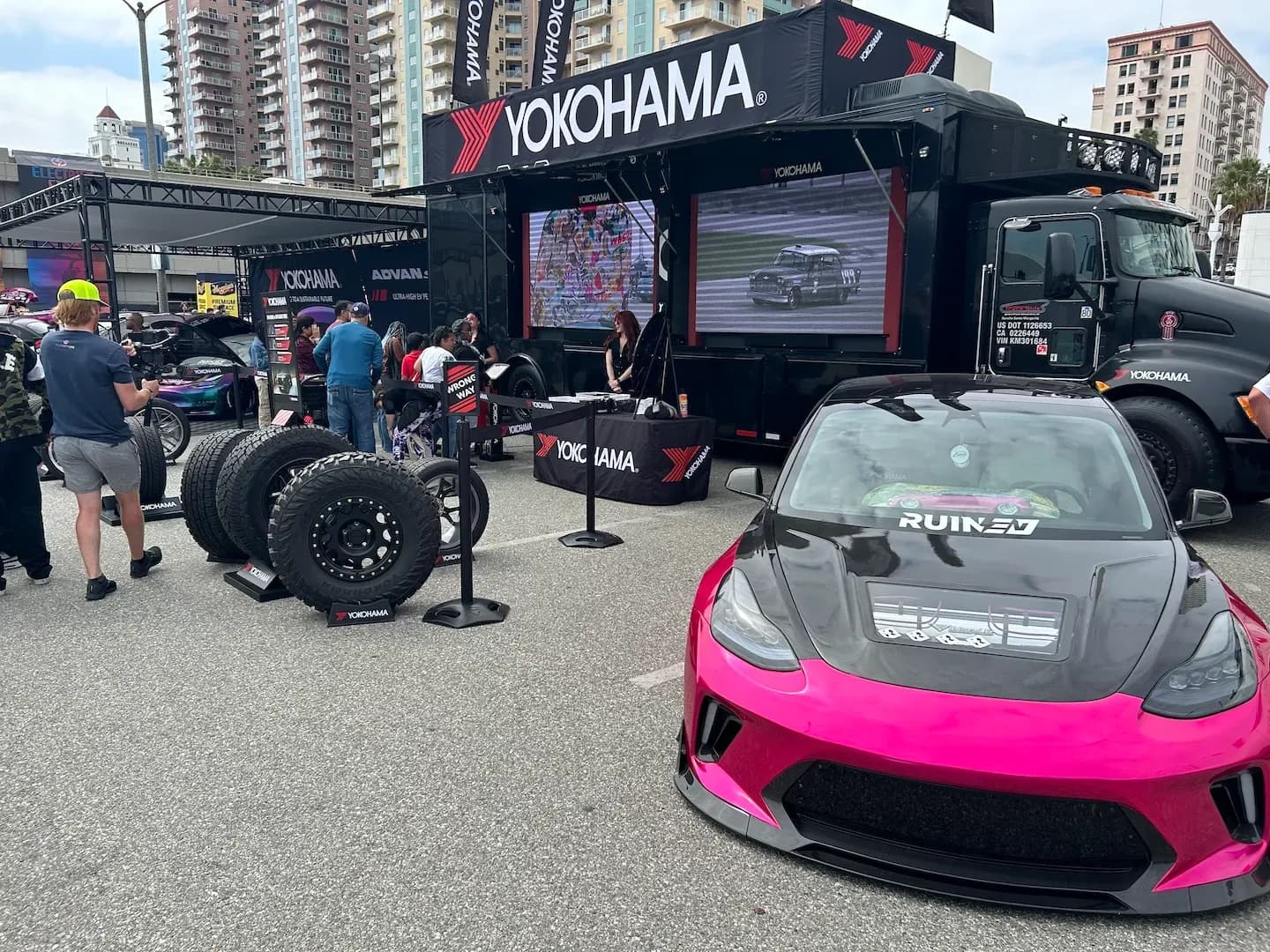 The Yokohama booth at Electrify Expo with a modified Tesla Model 3 on display
