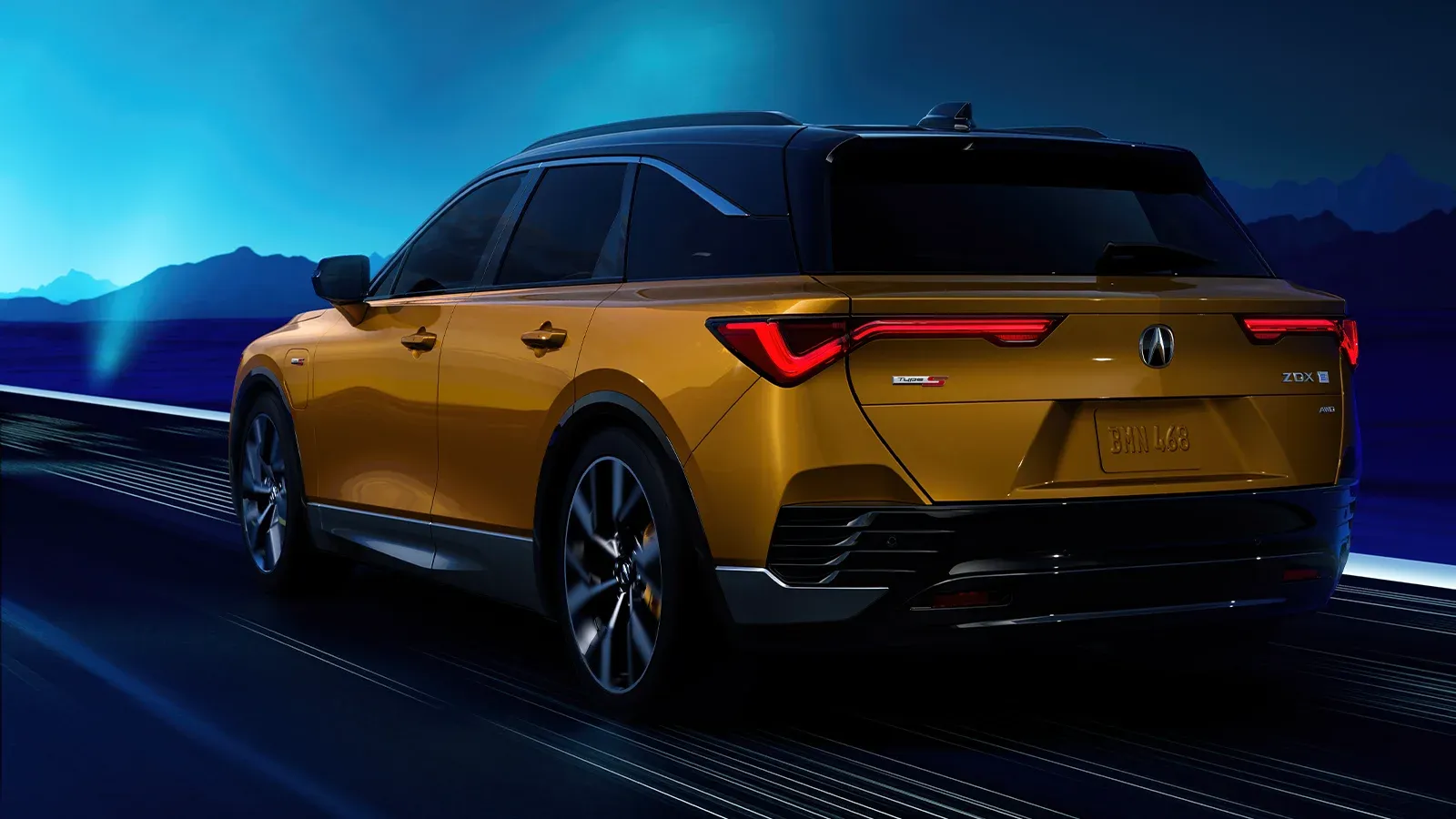 yellow 2024 Acura ZDX on the road
