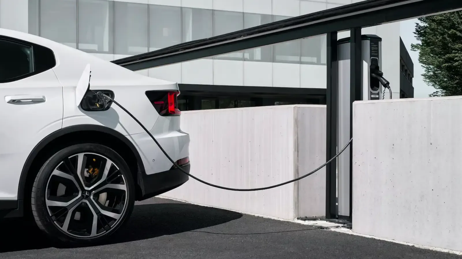 Cropped photo of a Polestar vehicle being charged