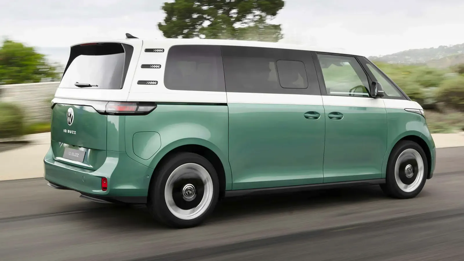 Side profile of Green Volkwagen ID.Buzz as it